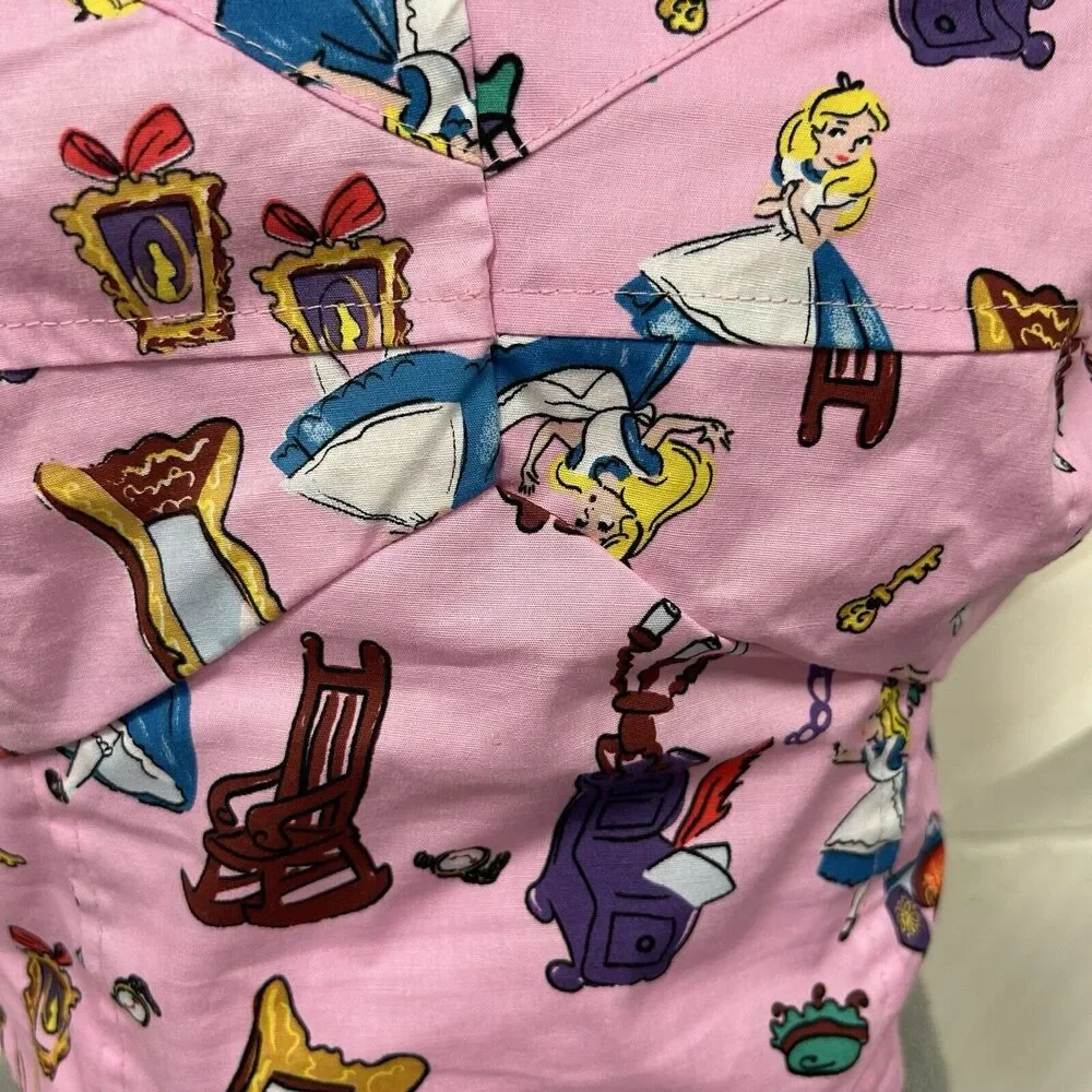 Her Universe Pink Alice Print Cropped Tank Top